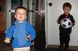 Two toddlers playing at home with toys