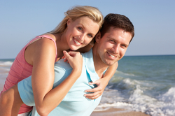 A man and a woman at the beach